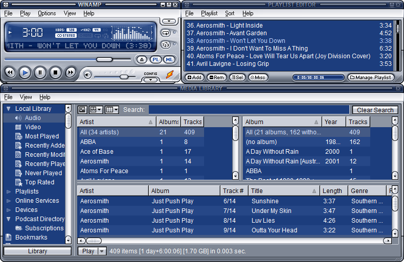 Интерфейс Winamp с окном плеера, плейлистом и медиатекой