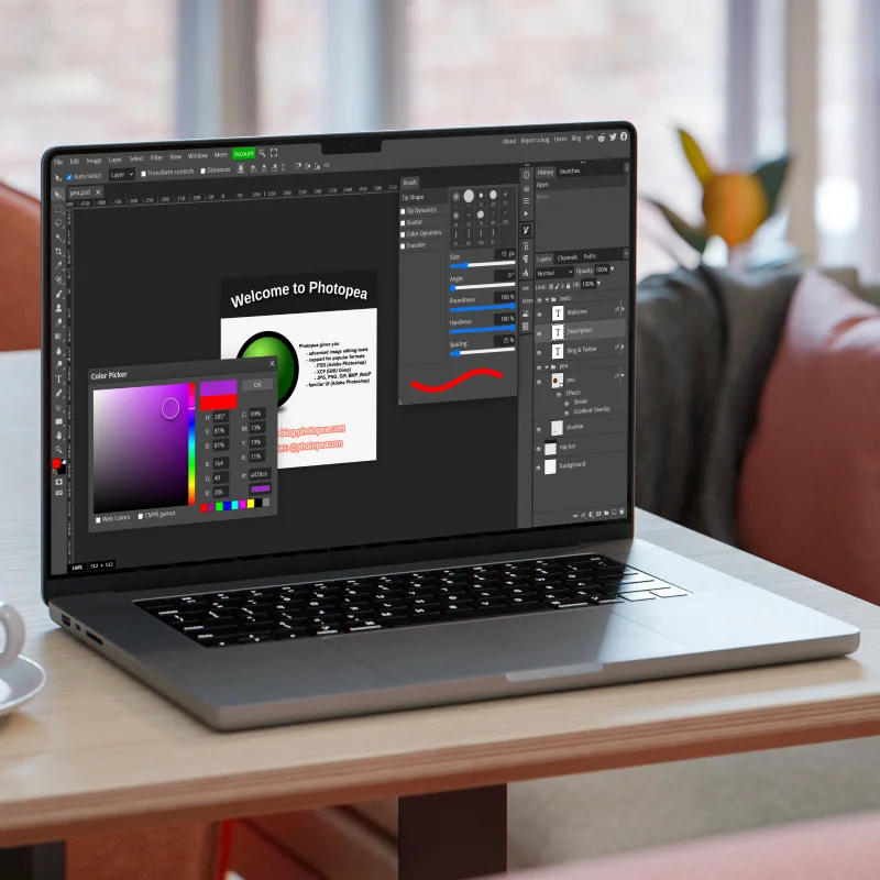 Photopea на ноутбуке с палитрой Color Picker, Brush и панелью Layers
